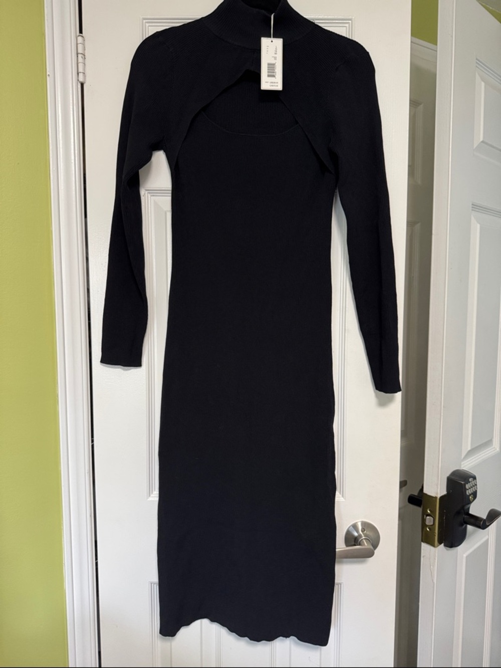 Elie Tahari sexy black ribbed knit dress 
Slim fitting size Large BNWT